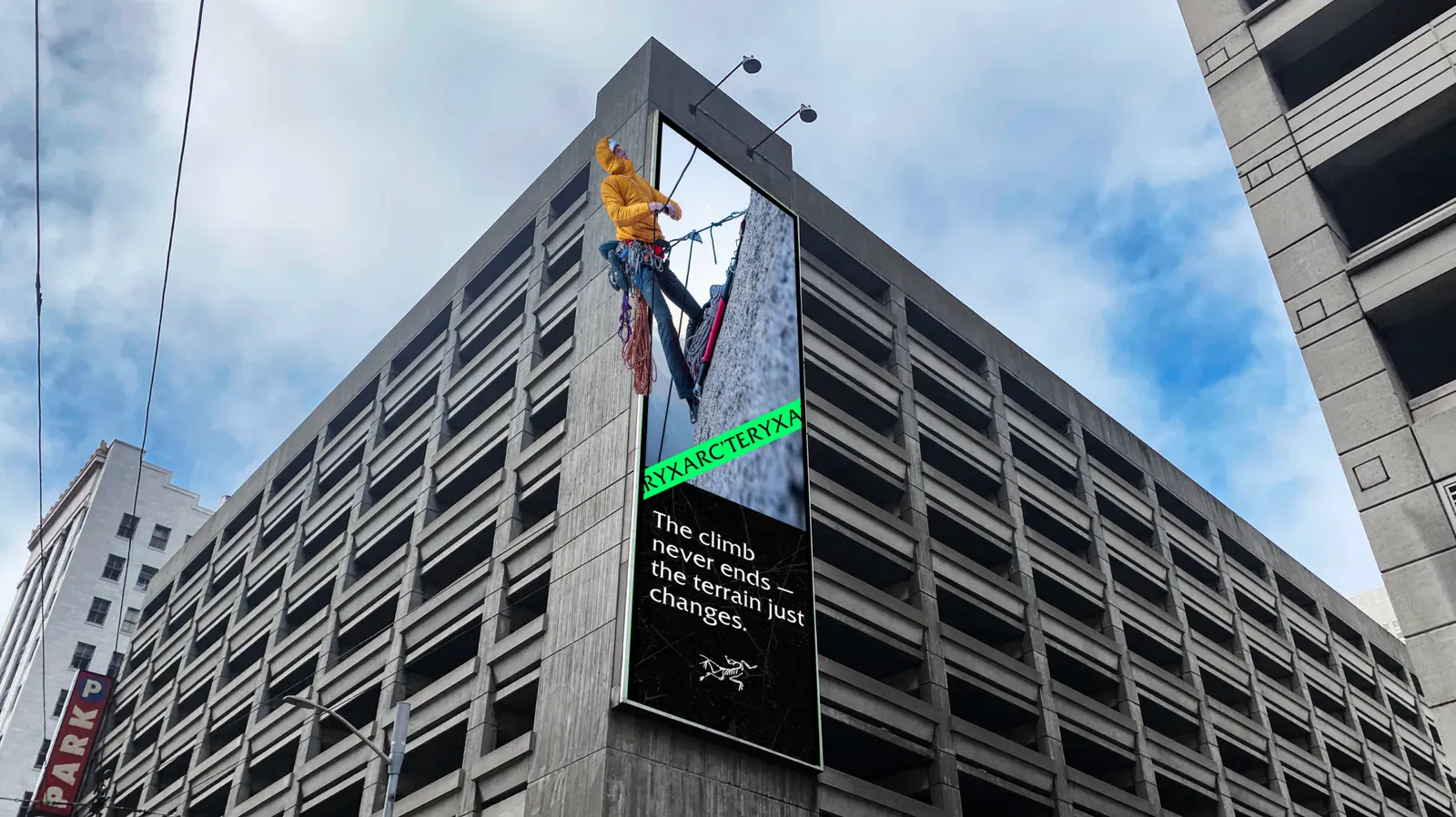 A vertical board scaling a parking garage.